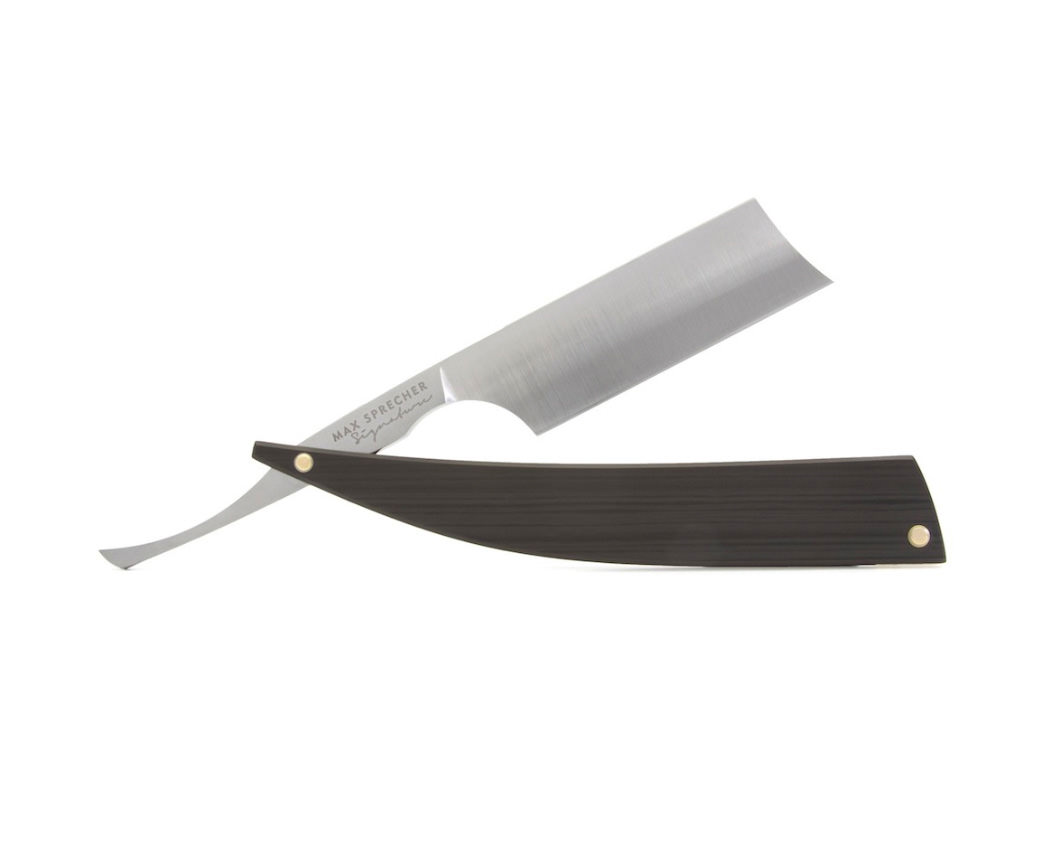 Hollow ground carbon steel straight razor with carbon fiber handle