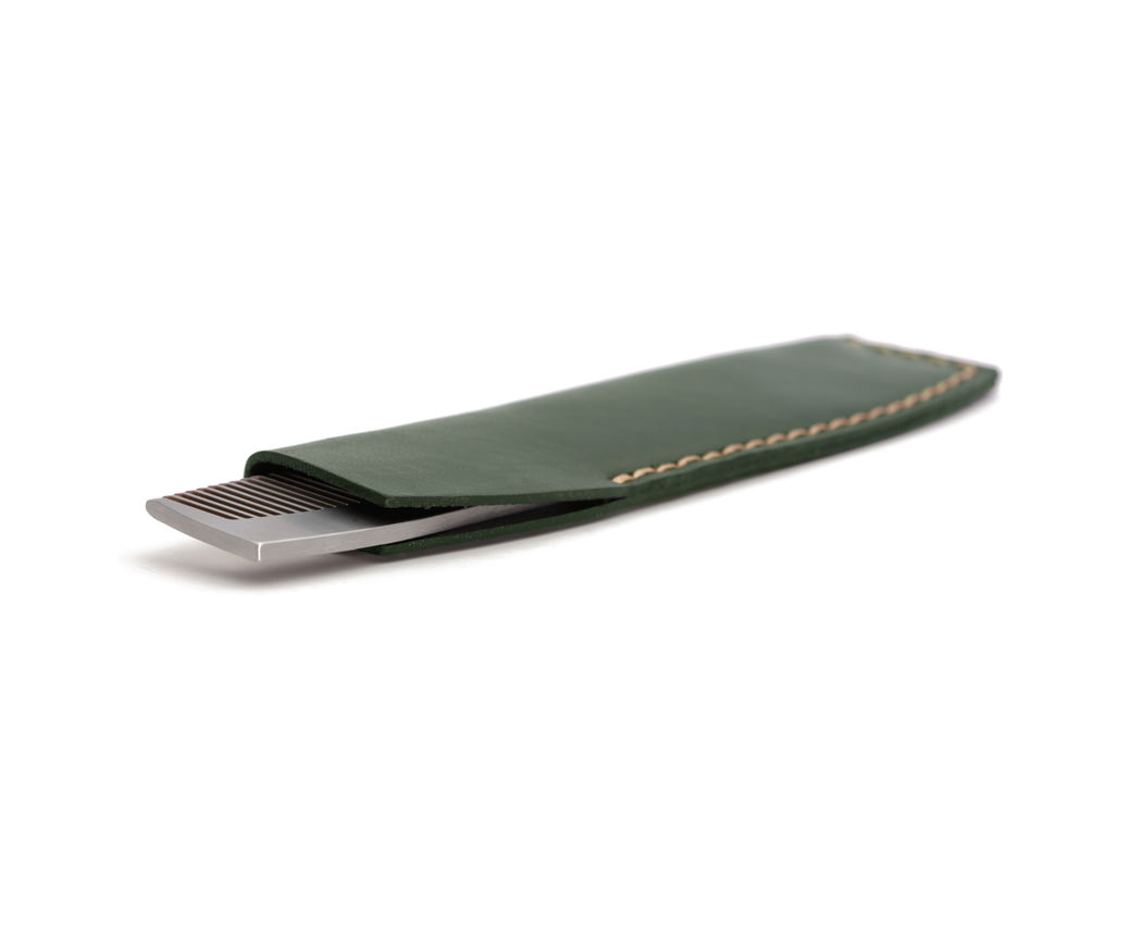 green leather comb holder