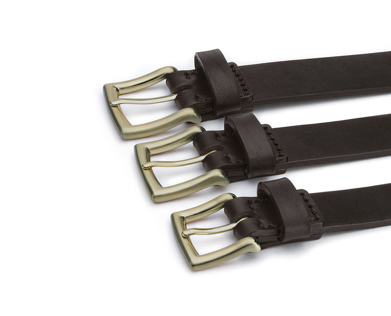 trio of brown mens leather belts with brass buckles