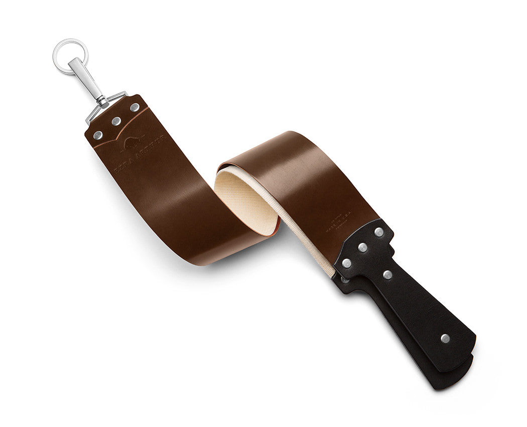 deep brown leather shaving strop with nickel hardware