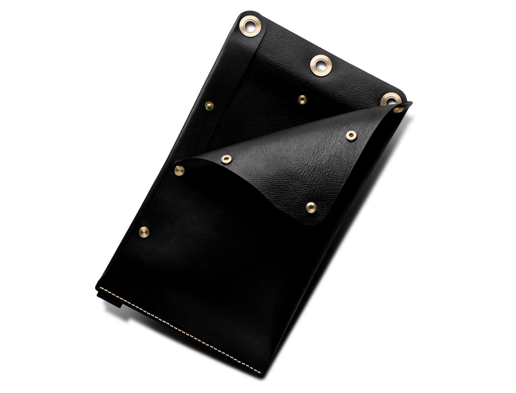 black leather traveling dopp kit