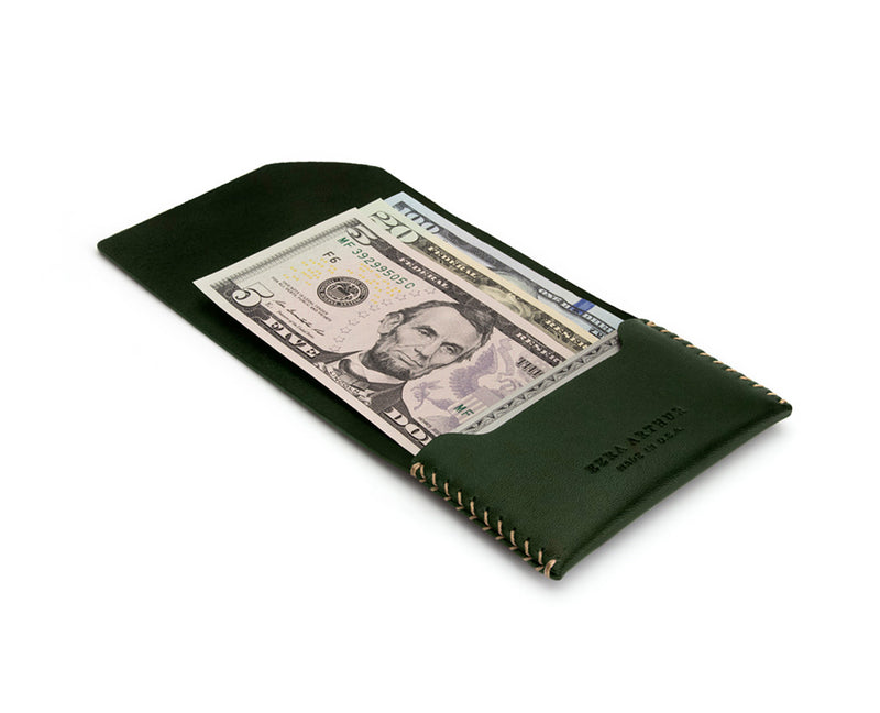 green leather wallet open