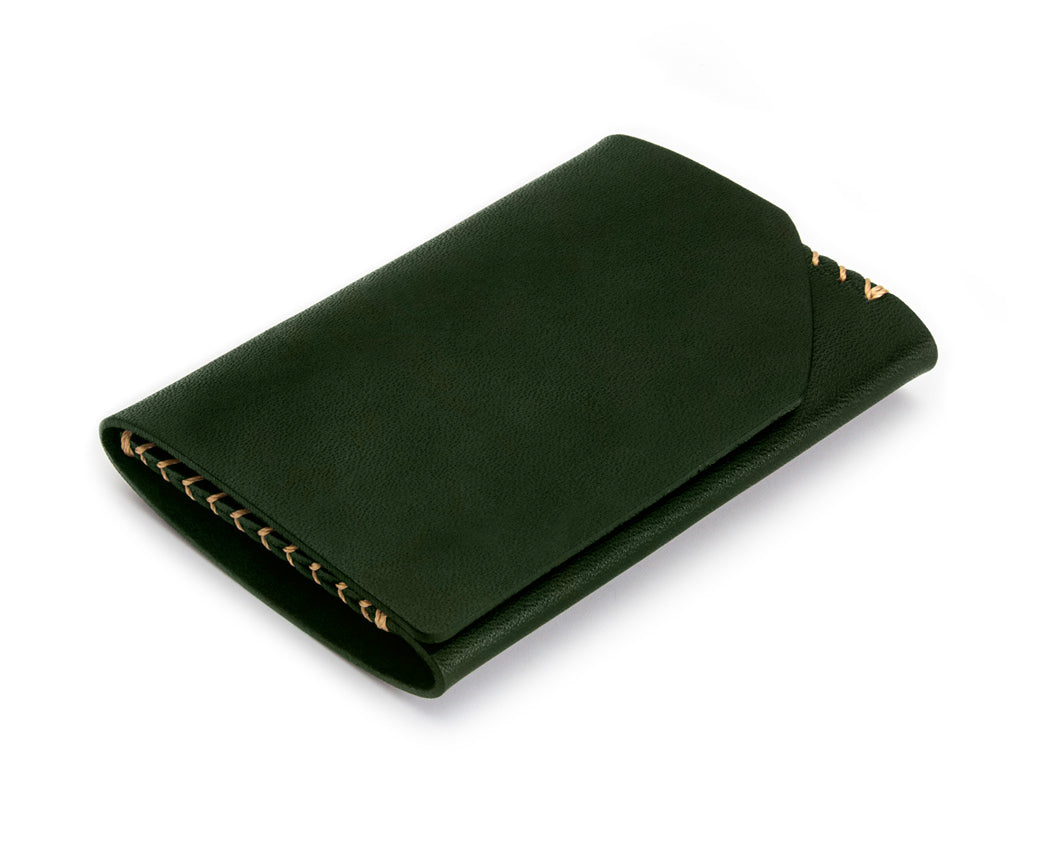 green folding compact wallet