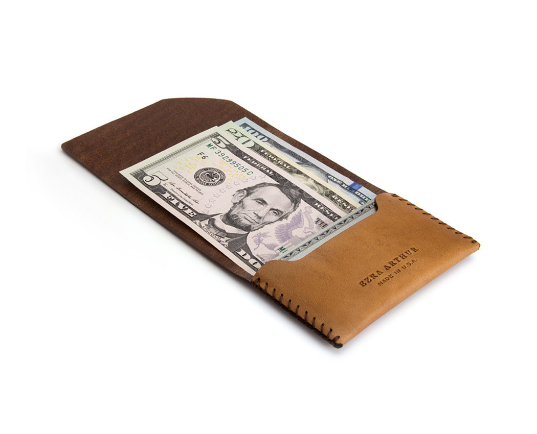 unfolded light brown leather wallet