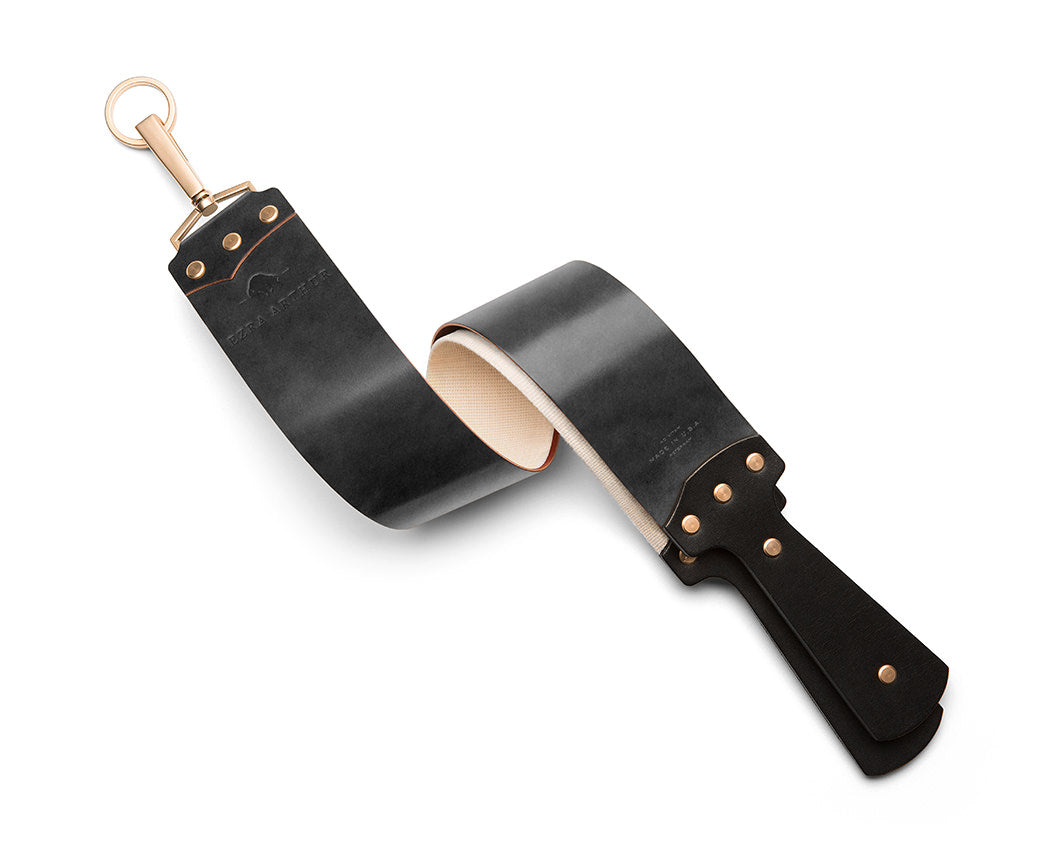 grey leather shaving strop with gold hardware
