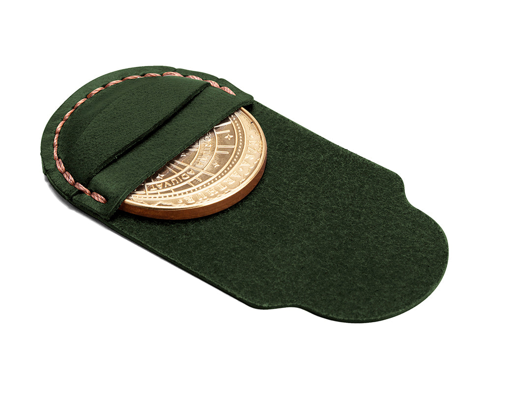 green leather decision coin holding pouch