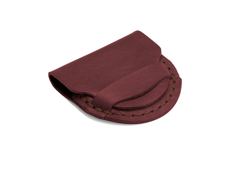 red leather holding pouch for decision coin