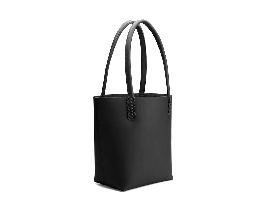 black leather tote back with woven handle detail