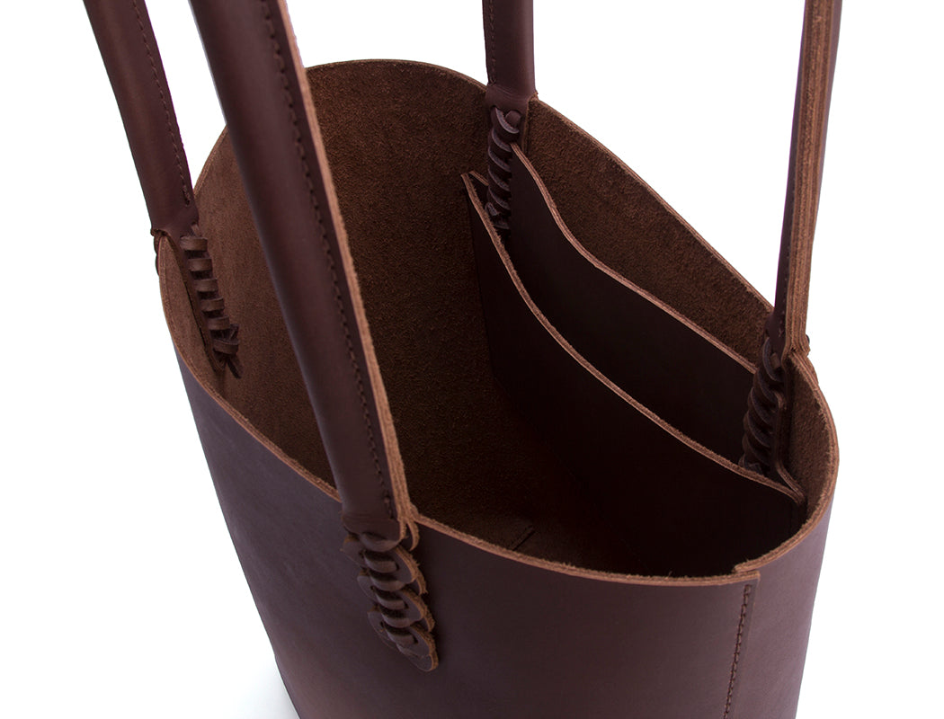 interior of brown leather tote bag\