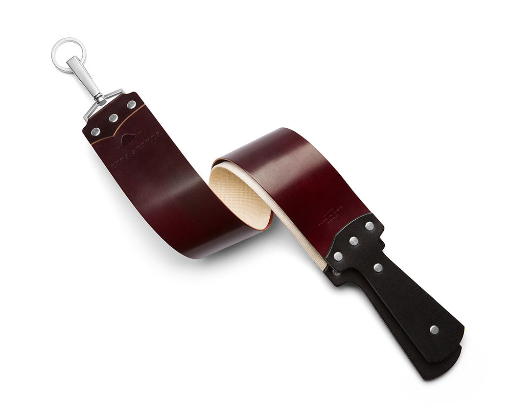 deep red leather shaving strop with nickel hardware