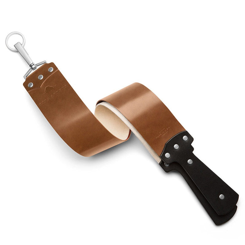 light brown leather strop with nickel clip and canvas